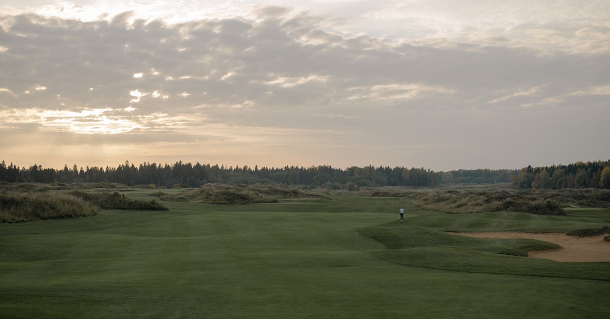 Links fairway at Castle Stuart Golf Links with views across the Moray Firth and the Scottish Highlands beyond